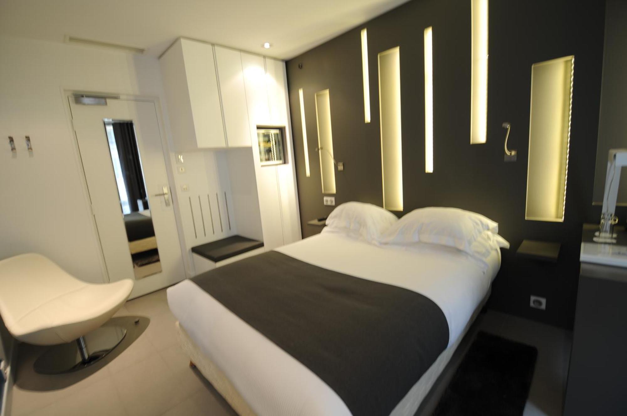 Hotel Arc De Triomphe Etoile París Habitación foto